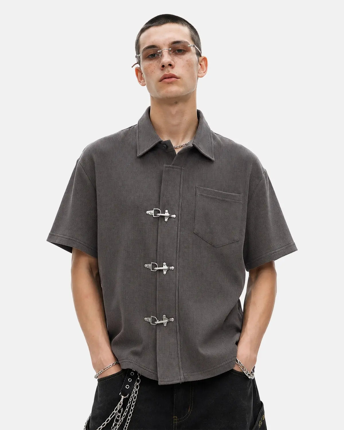 Dark gray Flation streetwear waffle shirt with metal clasp detail, casual long-sleeve shirt for everyday wear.
