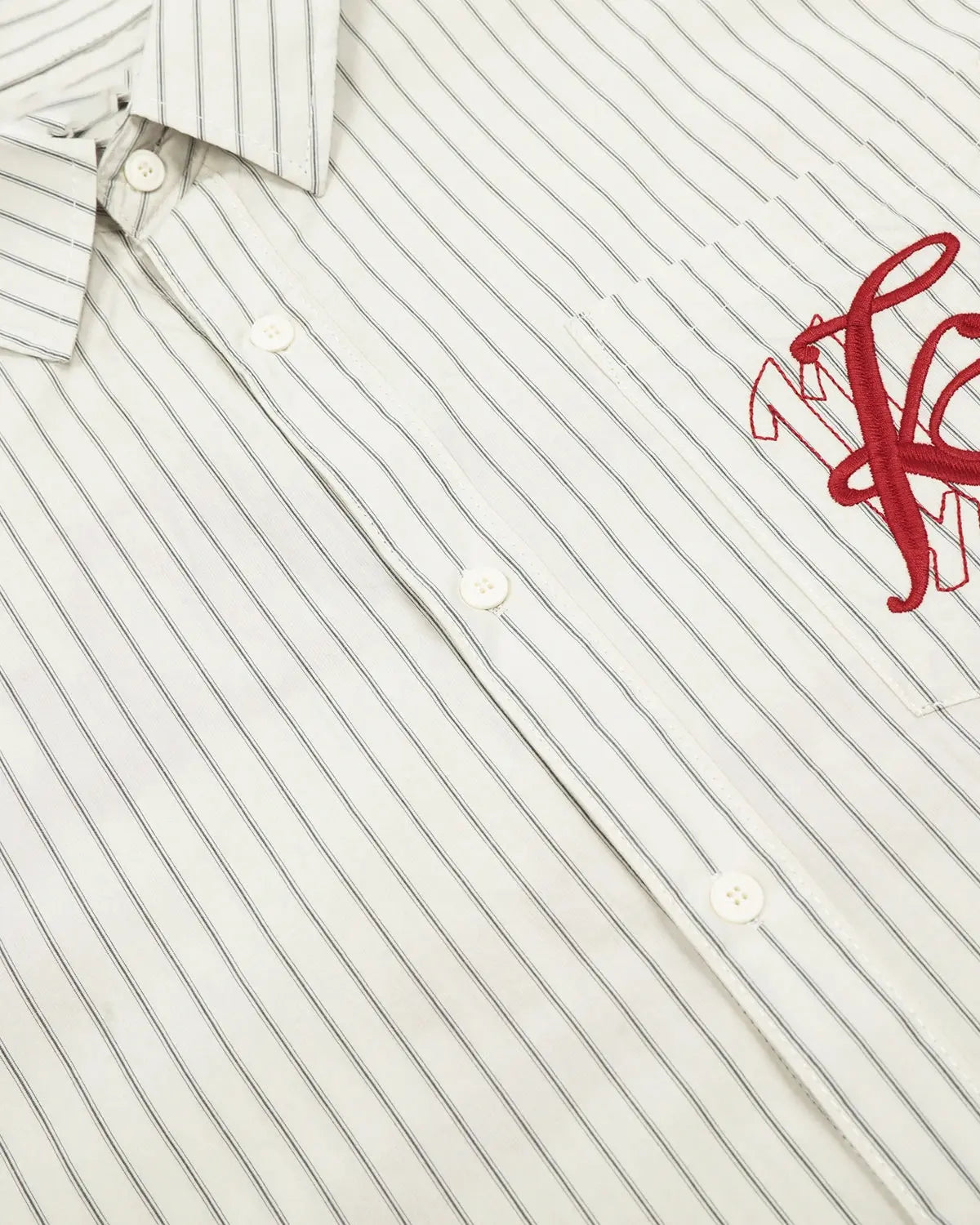 Striped embroidered short-sleeve shirt by Flation featuring colorful stripes and detailed embroidery, casual streetwear style.