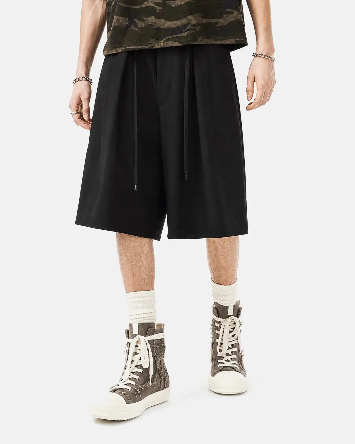 Black Flation streetwear drawstring wide-leg tailored shorts with a relaxed fit and structured design, perfect for casual wear.