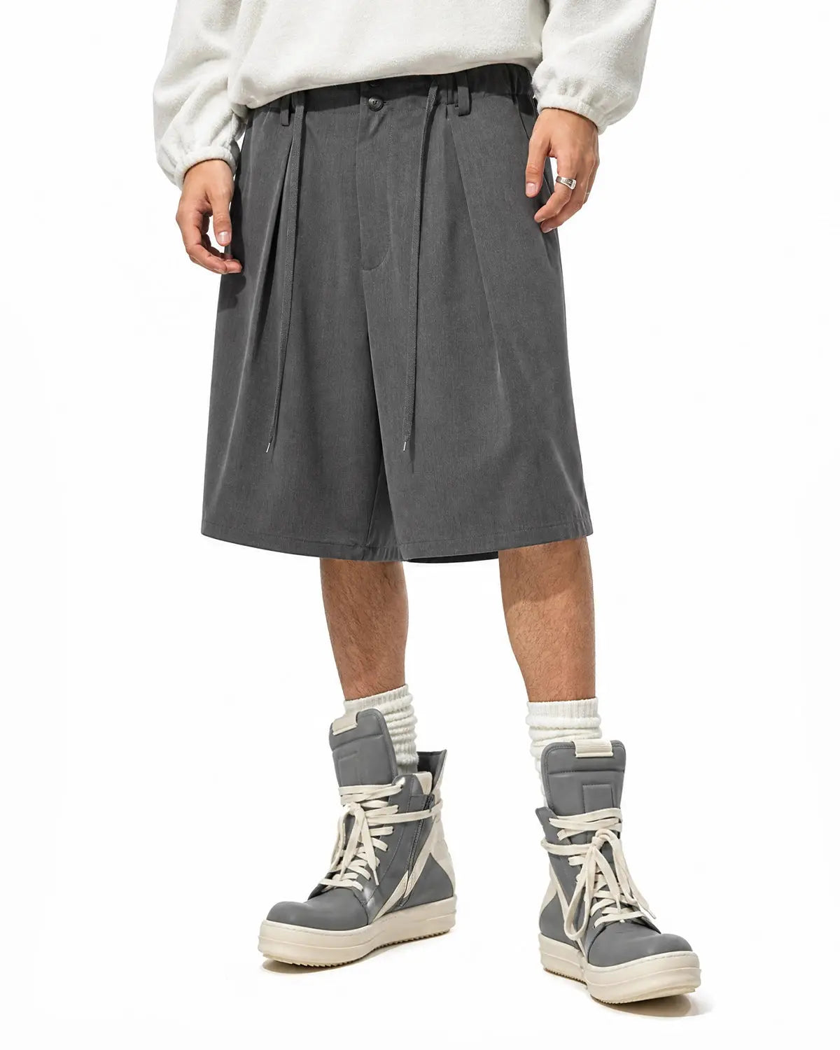 Black Flation streetwear drawstring wide-leg tailored shorts with a relaxed fit and structured design.