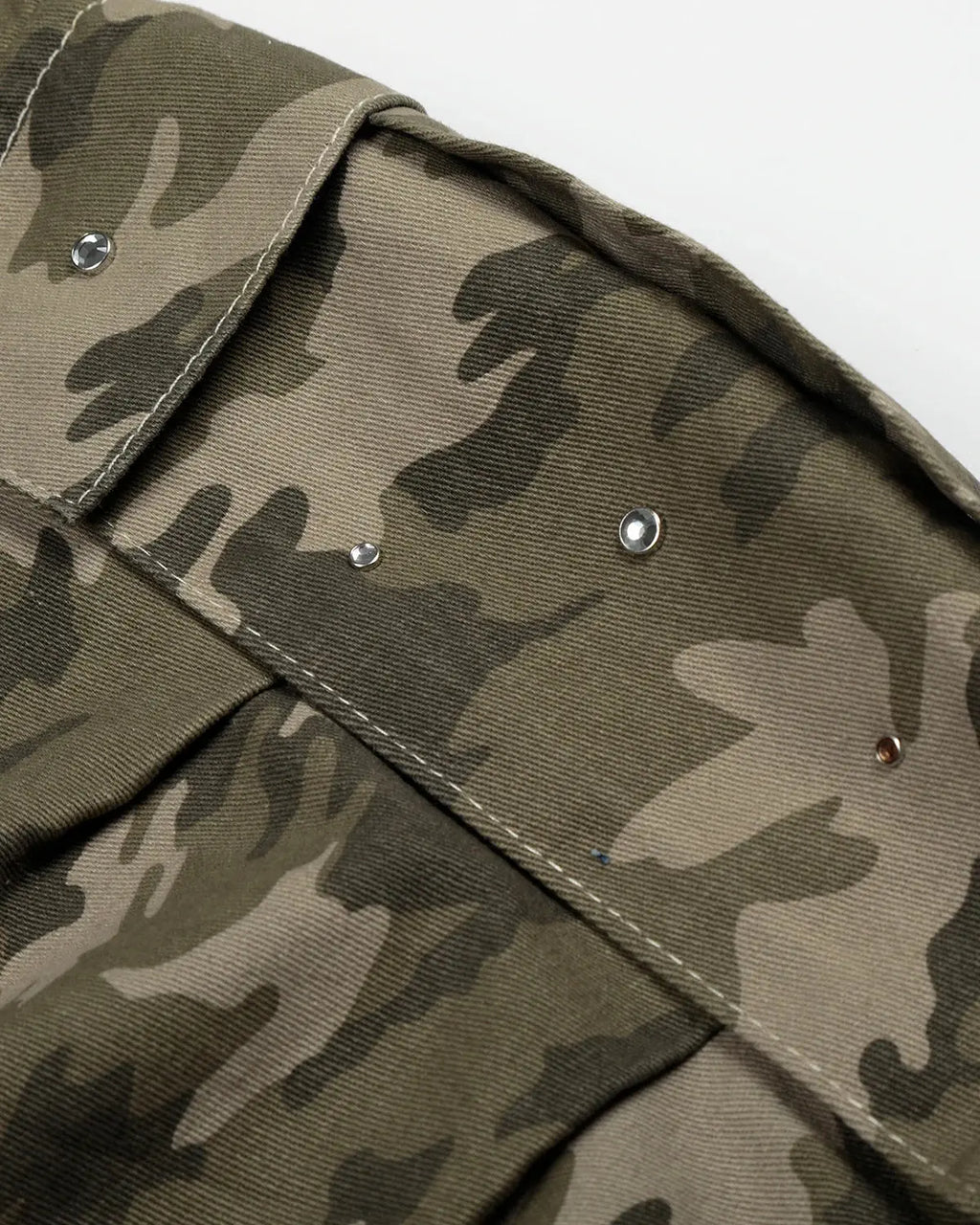 Embroidered camo cargo longline shorts by Flation Streetwear, featuring camouflage pattern and functional pockets.