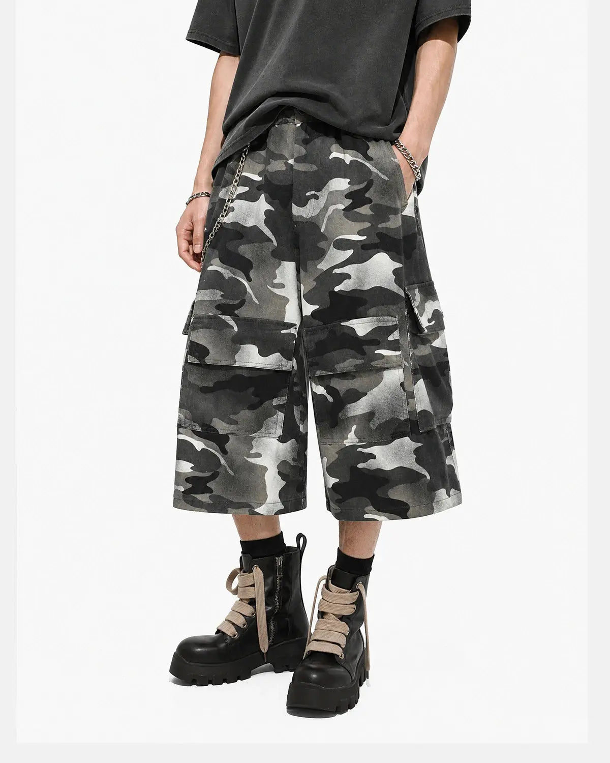 Grey camo Flation utility longline shorts for men, featuring a relaxed fit and streetwear style, with multiple pockets and a casual look.