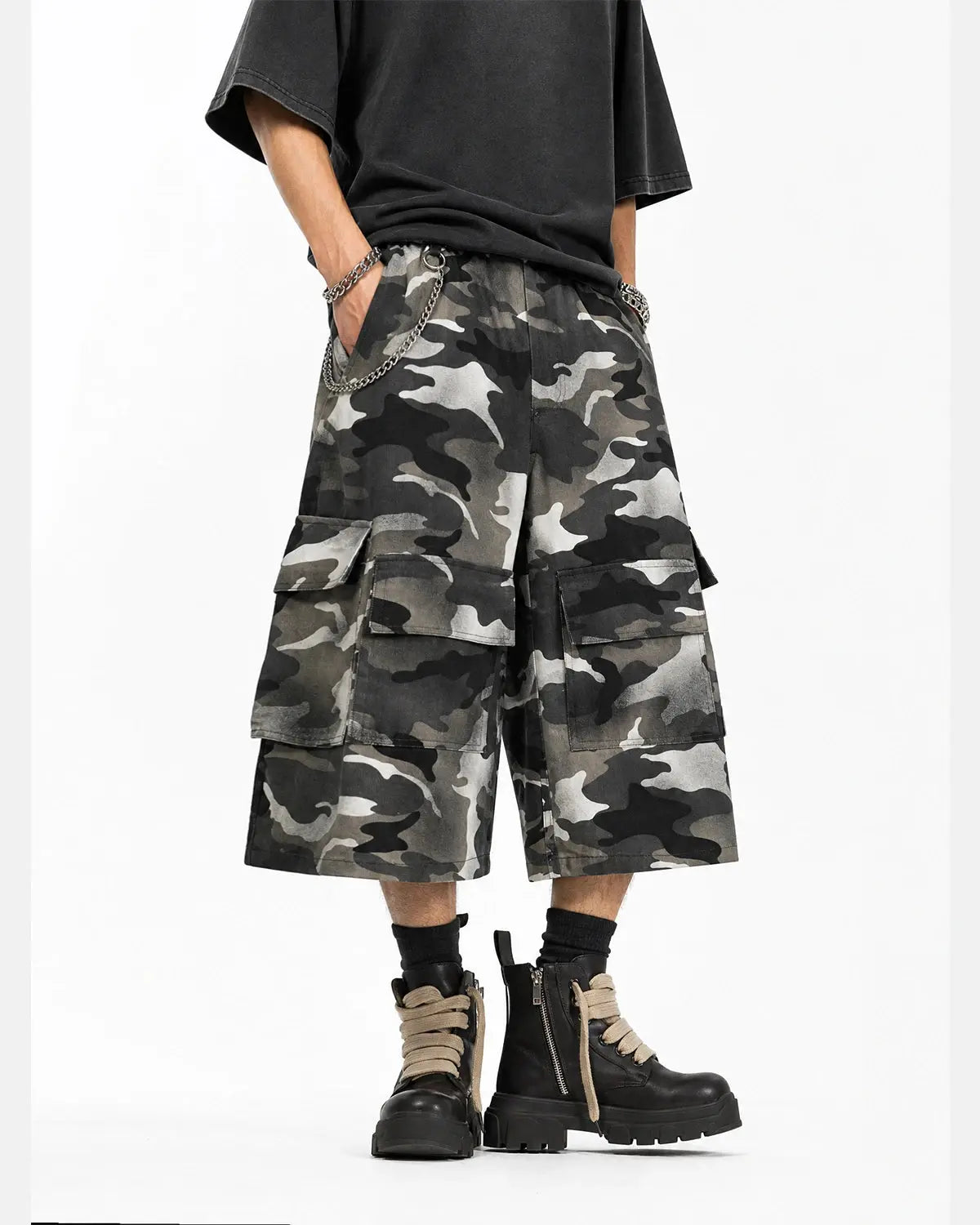Grey camo utility longline shorts by Flation Streetwear, featuring a relaxed fit and functional side pockets.