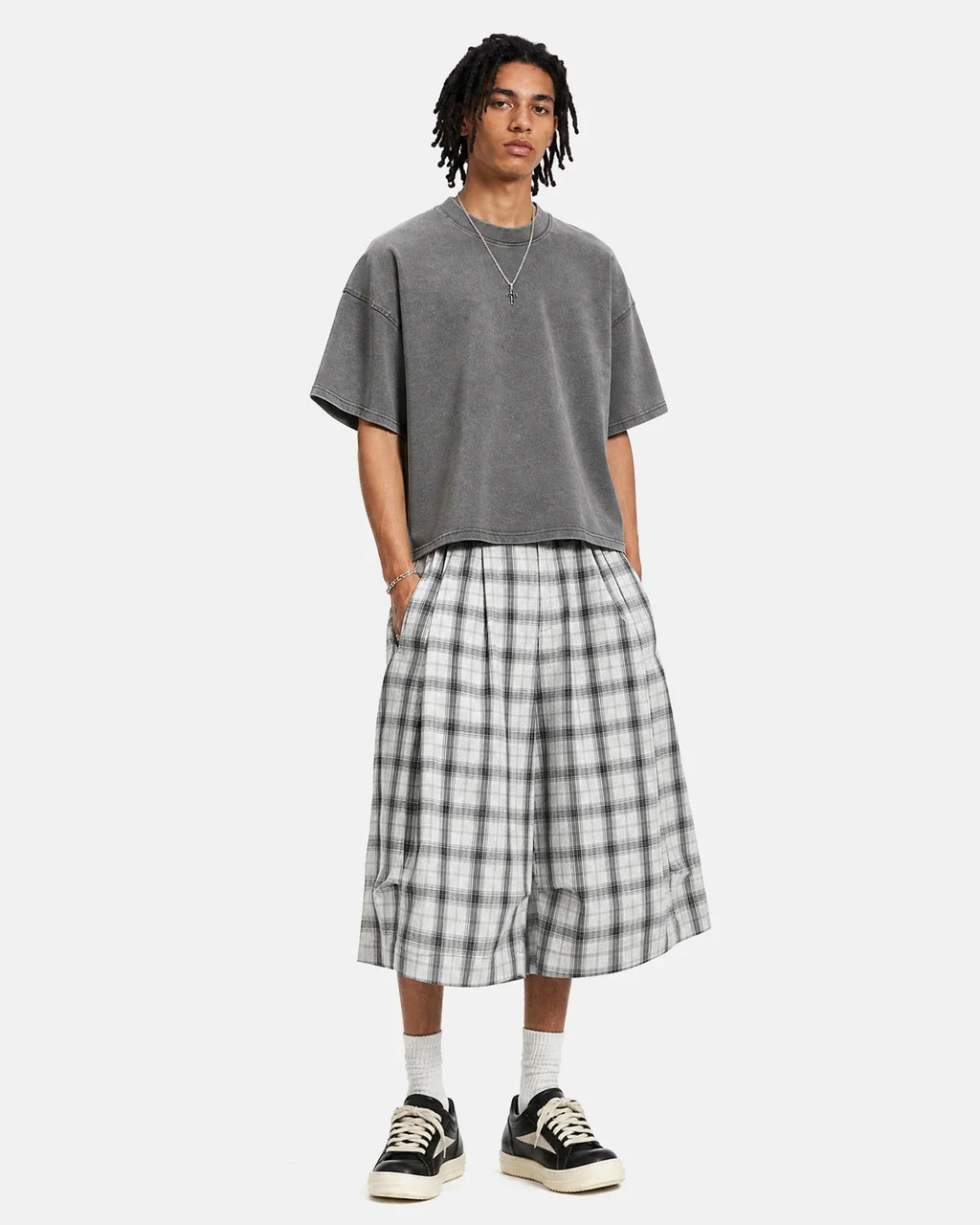 Plaid longline casual shorts by Flation Streetwear featuring a relaxed fit and stylish plaid pattern.