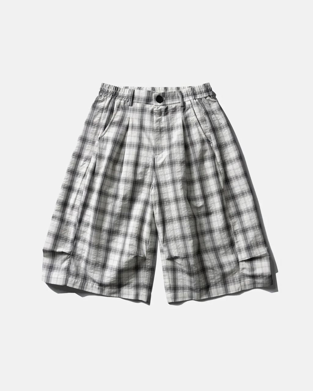 Flation plaid longline casual shorts with a relaxed fit, featuring a stylish plaid pattern and comfortable waistband.