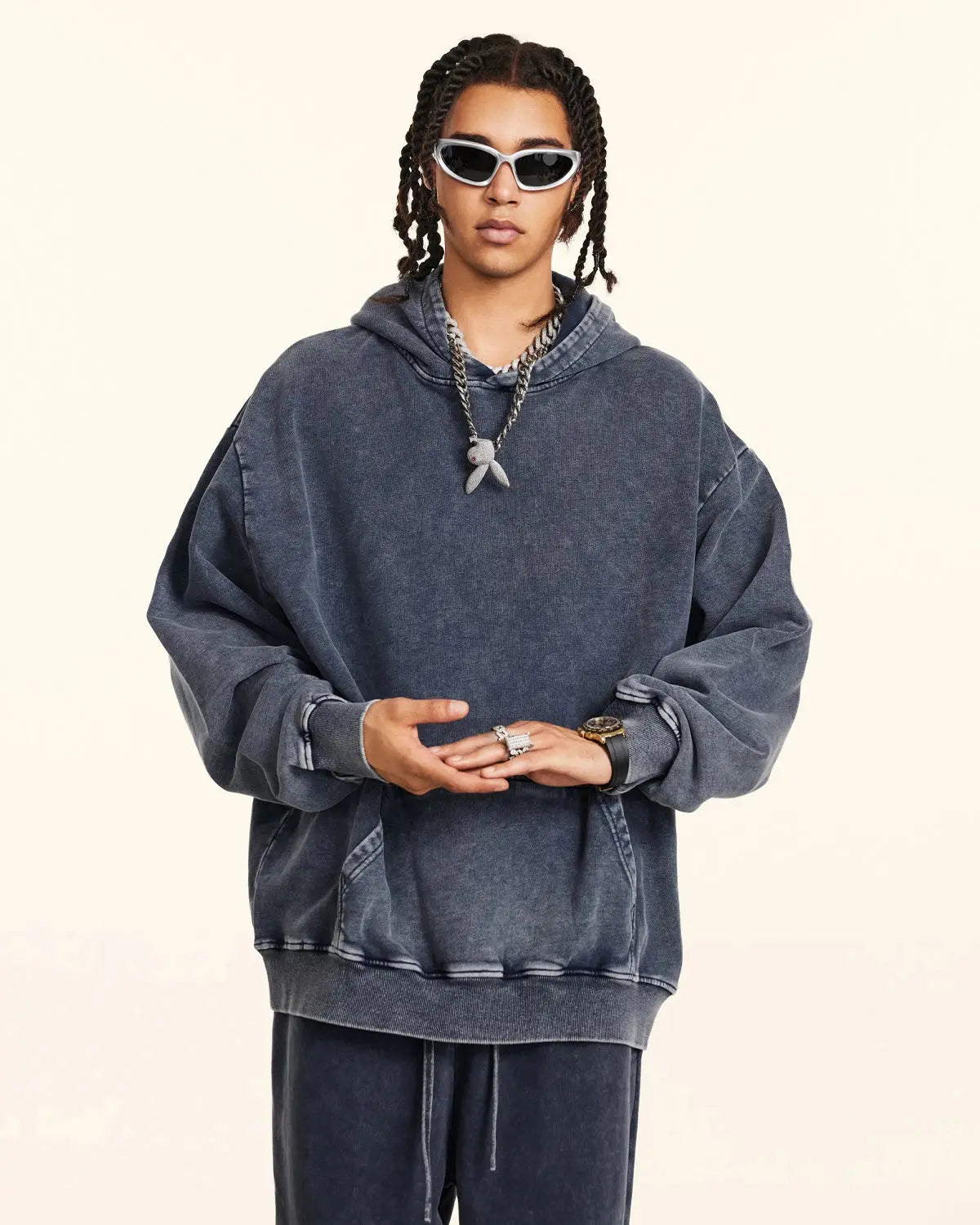 Acid washed French Terry hoodie by Flation streetwear featuring a relaxed fit and casual style, shown on a model.