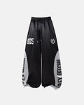 Black glossy contrast barrel sweatpant by Flation Streetwear, featuring a sleek, fitted design with stylish contrast detailing.