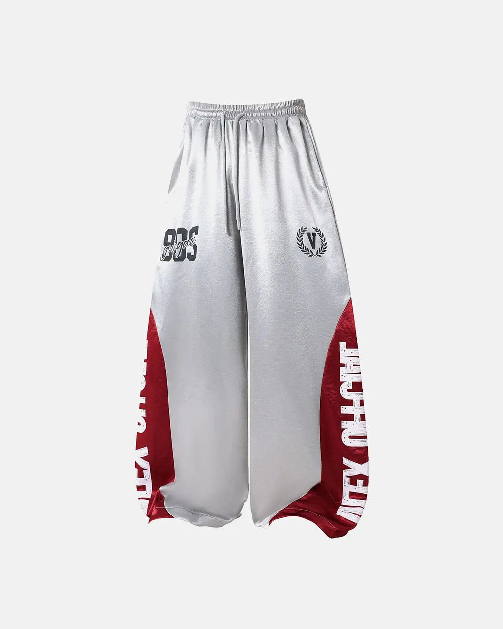 Black glossy contrast barrel sweatpants by Flation Streetwear, featuring a relaxed fit and stylish design.