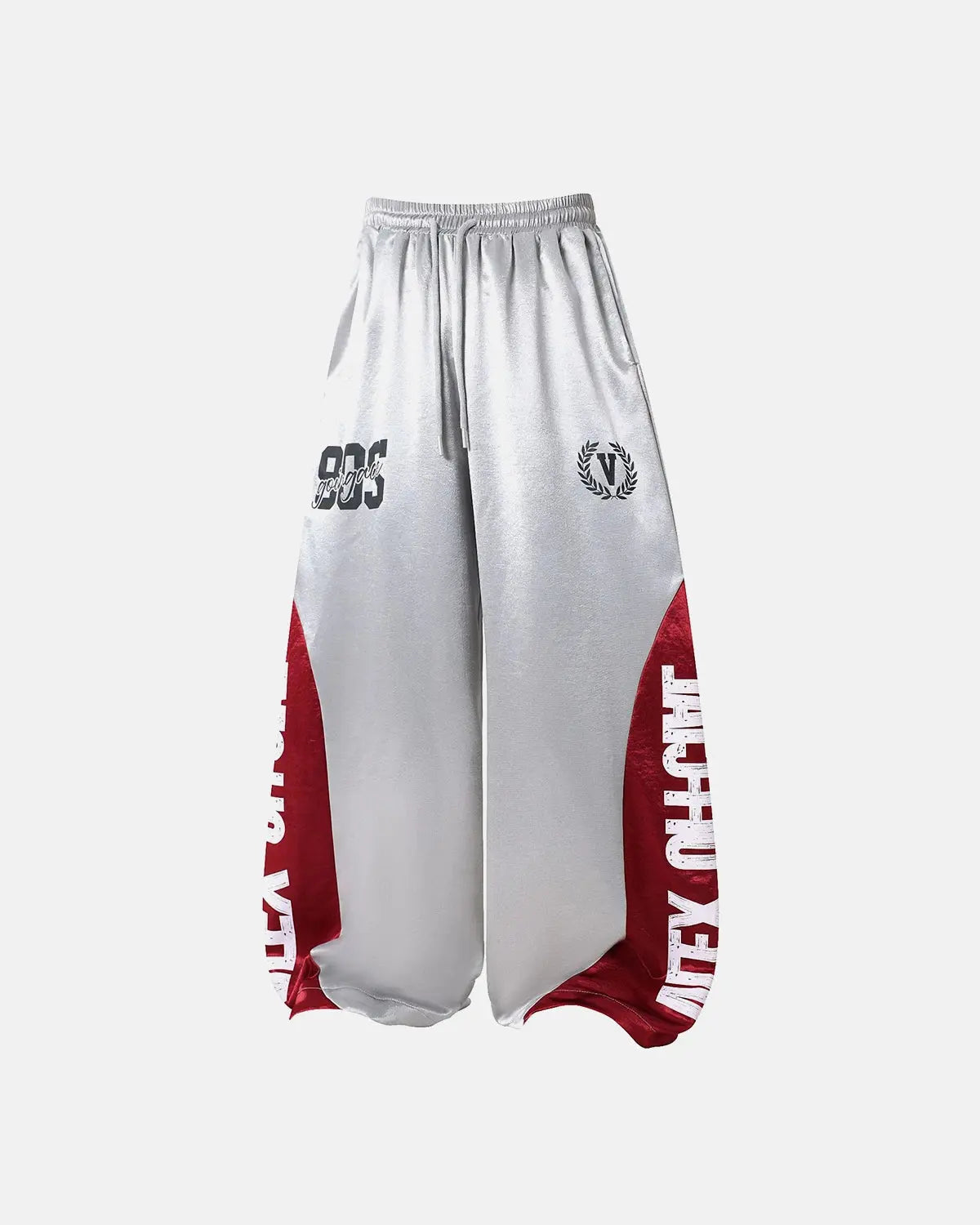Black glossy contrast barrel sweatpants by Flation Streetwear, featuring a relaxed fit and stylish design.
