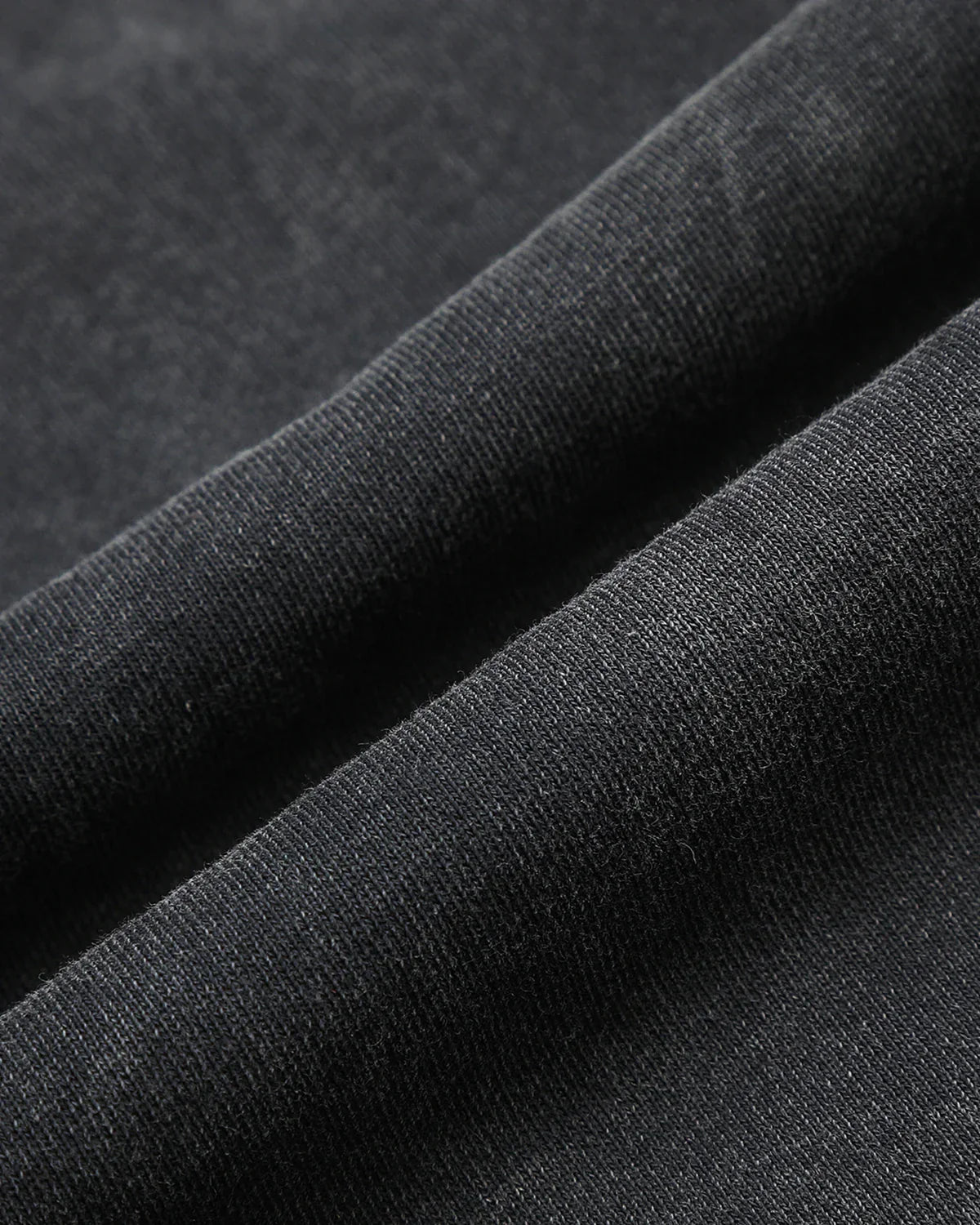 Dark grey washed graphic wide-leg sweatpants by Flation Streetwear, featuring relaxed fit and trendy streetwear style.