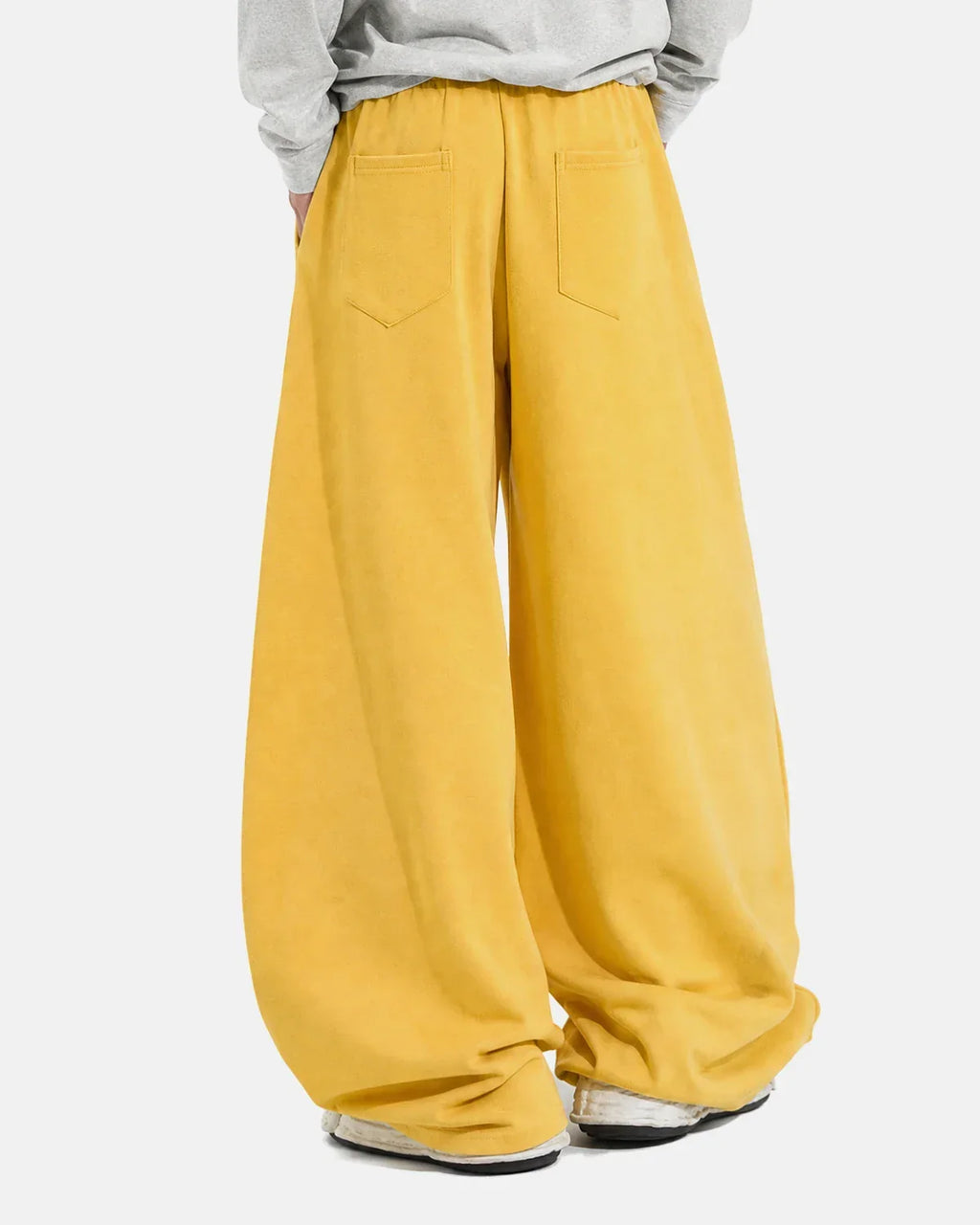 Yellow star graphic barrel sweatpants by Flation Streetwear, featuring a relaxed fit and bold star design on soft fabric.