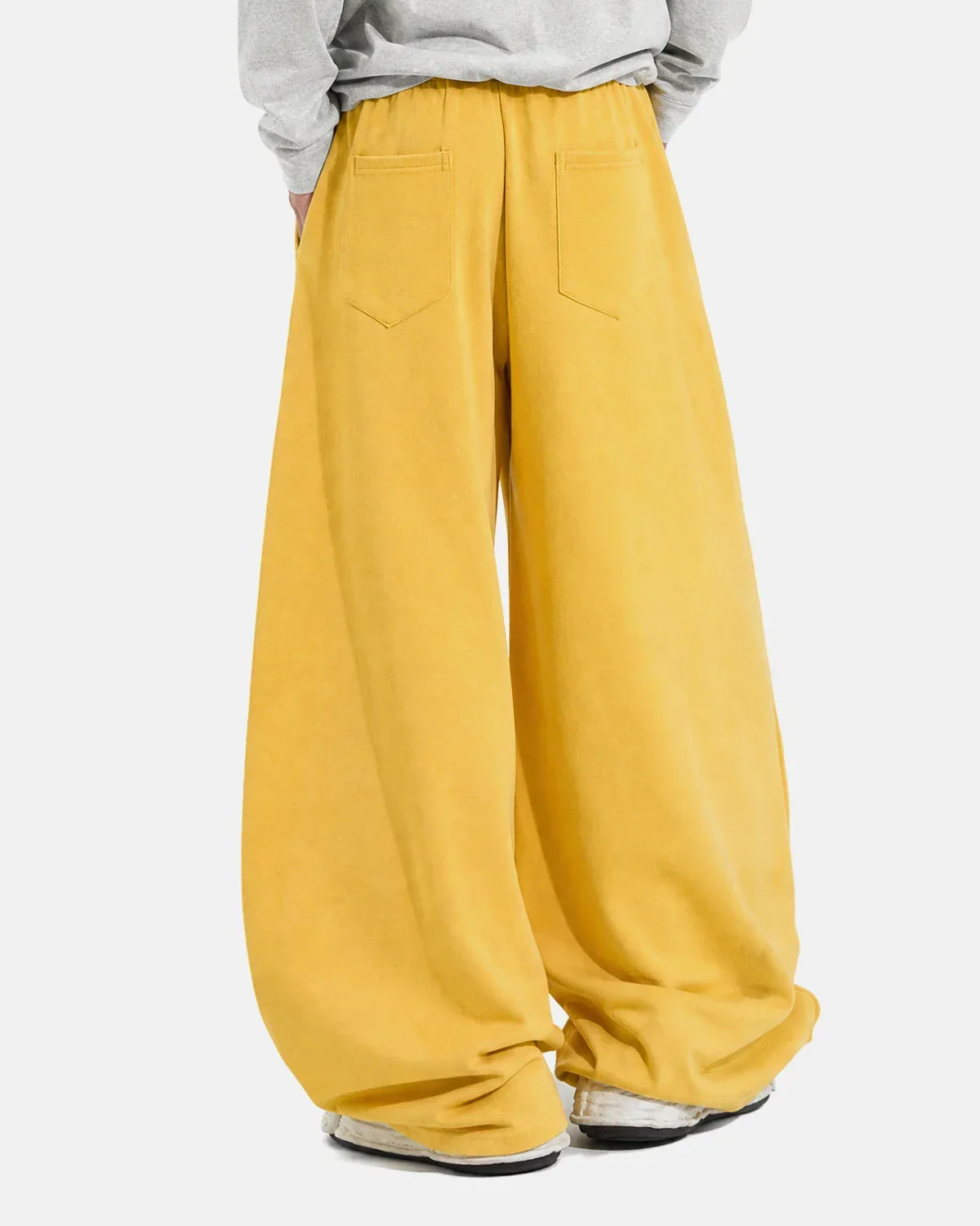 Yellow star graphic barrel sweatpants by Flation Streetwear, featuring a relaxed fit and bold star design on soft fabric.