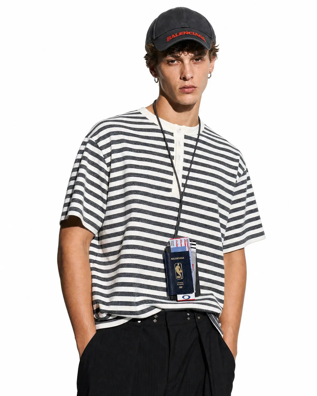 Apricot striped Flation relaxed Henley T-shirt with long sleeves, casual streetwear style, featuring a buttoned neckline and comfortable fit.