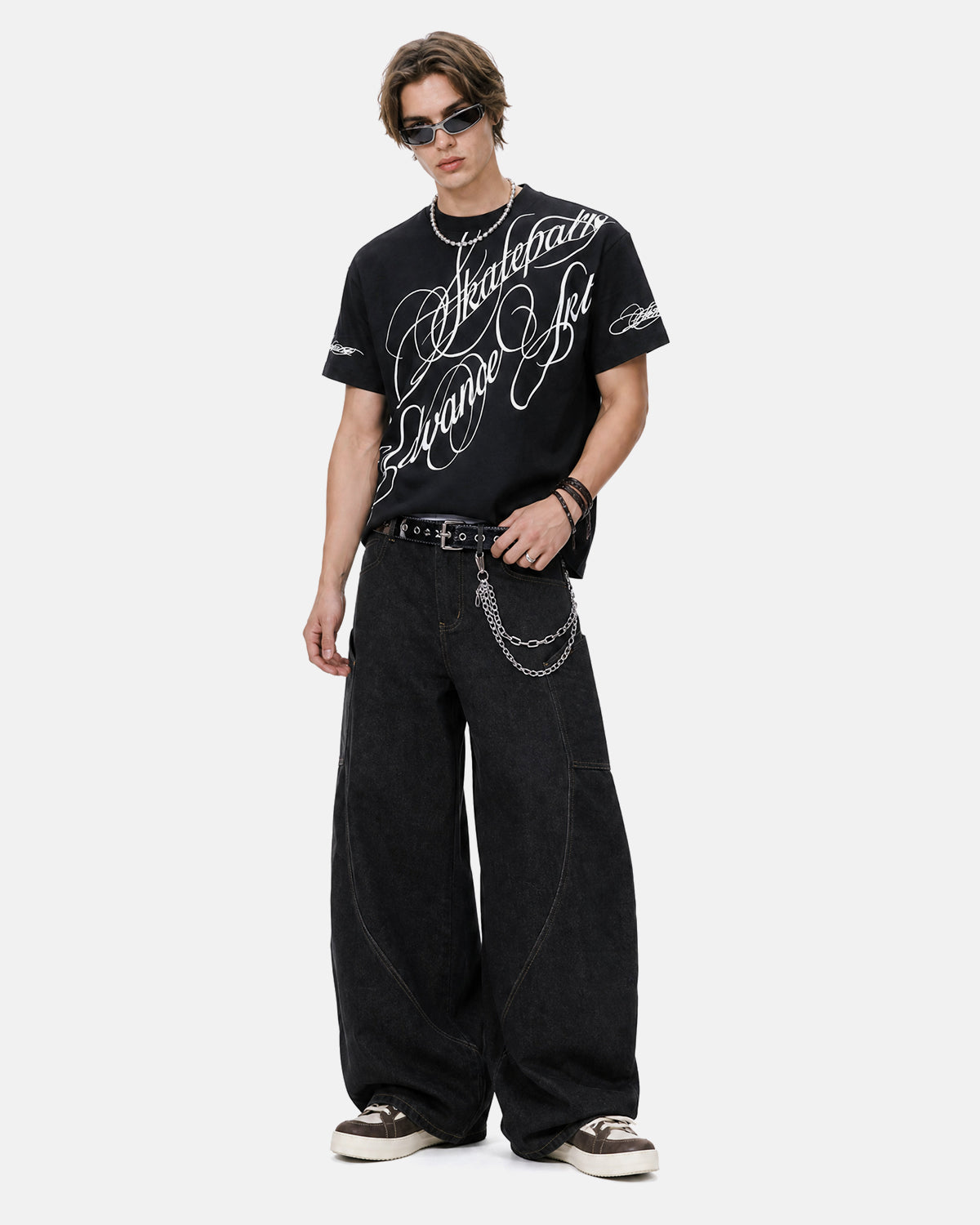 Black Flation streetwear T-shirt with all-over script graphic print, casual crew neck design, and short sleeves.