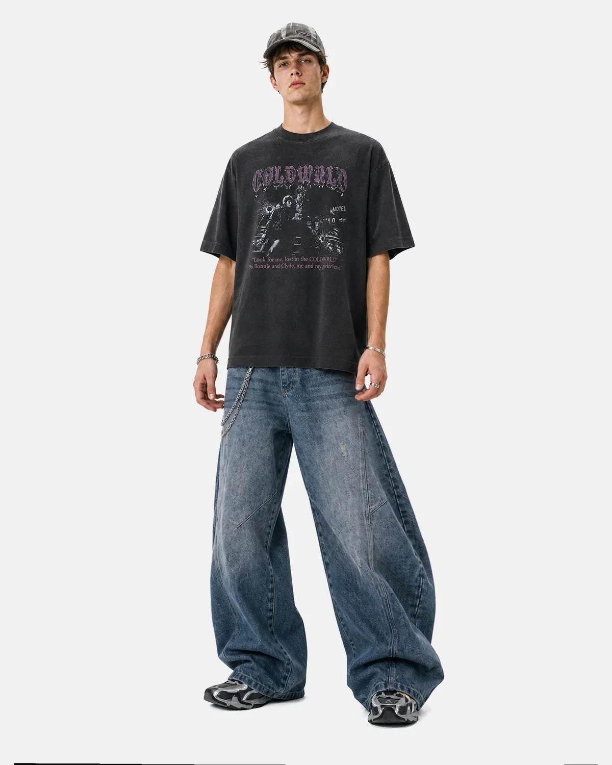 Black washed Gothic graphic T-shirt by Flation featuring bold design and streetwear style, displayed on a plain background.