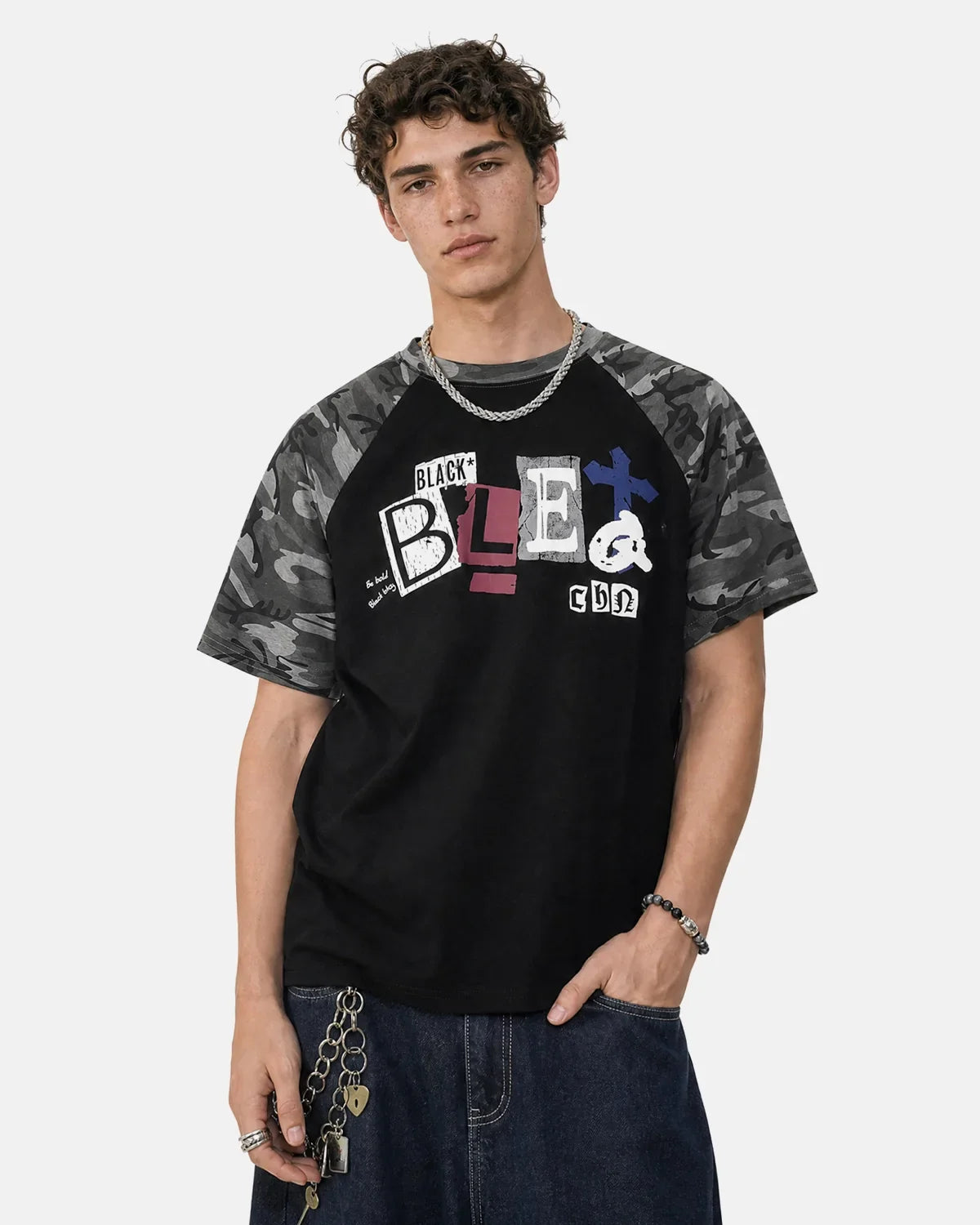 Black camo sleeve graphic boxy T-shirt by Flation Streetwear, featuring a bold printed design on the front.