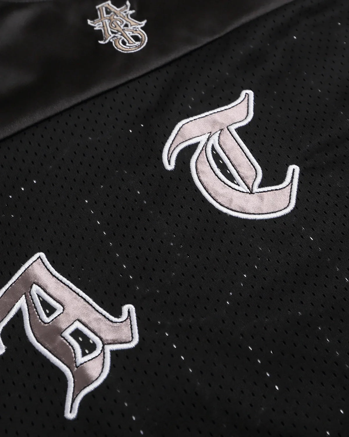 Black Gothic embroidered mesh jersey T-shirt by Flation Streetwear, featuring intricate embroidery and breathable mesh fabric.