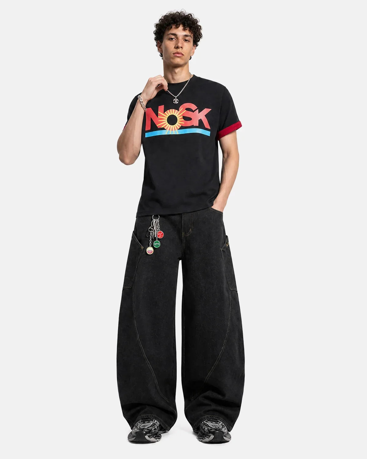 Black Flation Graphic Layered T-Shirt featuring a bold streetwear design and layered style, made for casual, stylish looks.