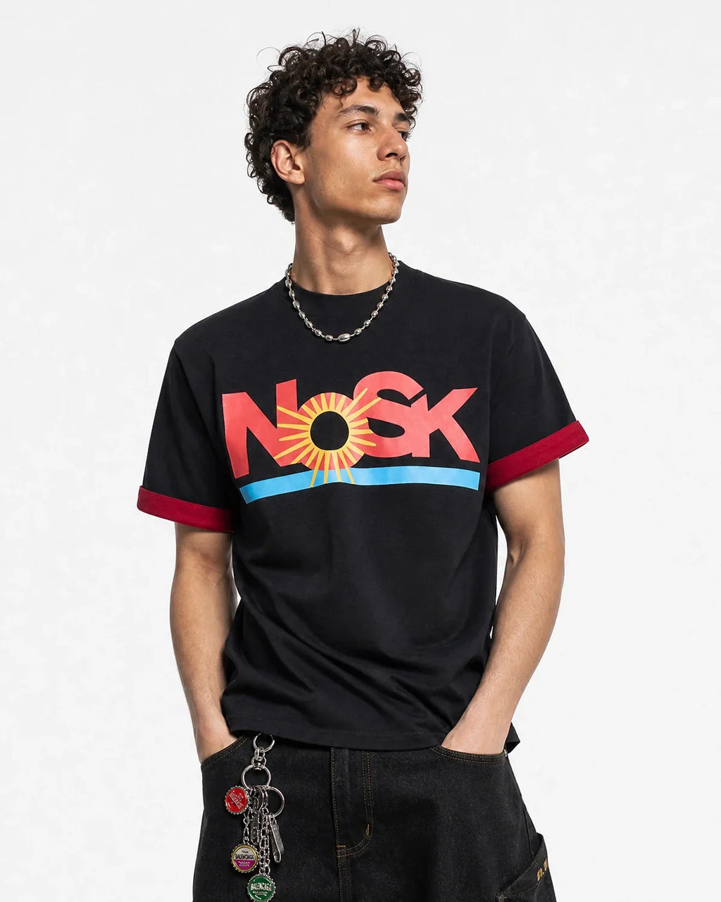 Black Flation streetwear layered graphic T-shirt with bold design and modern style, featuring a relaxed fit and contemporary streetwear look.