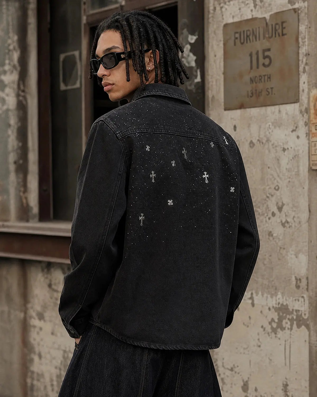 Black Flation streetwear T-shirt featuring a starry cross rhinestone design on washed denim fabric.