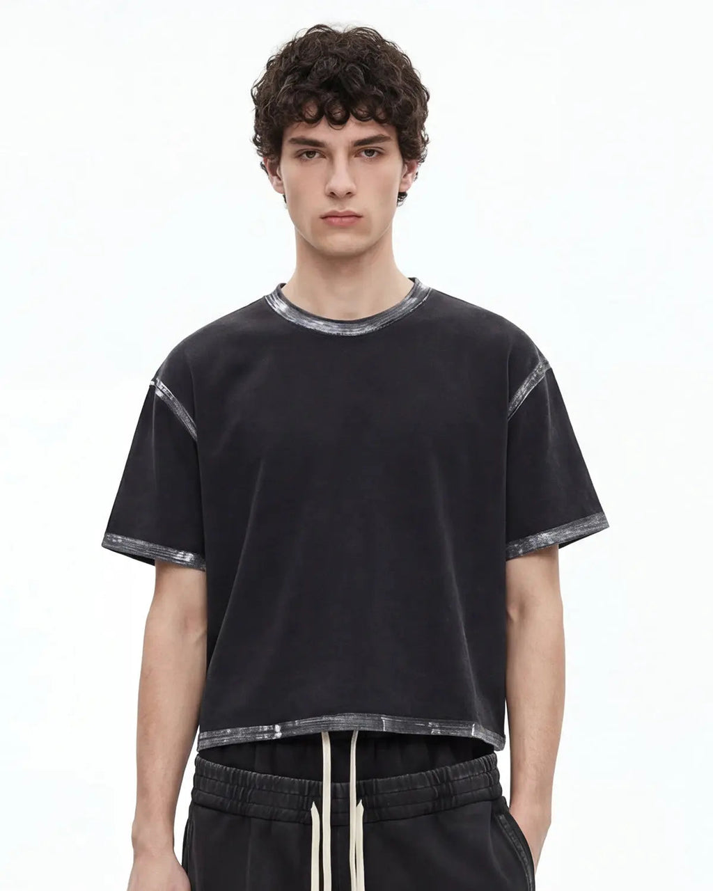 Black heavyweight boxy T-shirt by Flation Streetwear featuring a distressed wash finish, casual streetwear style.