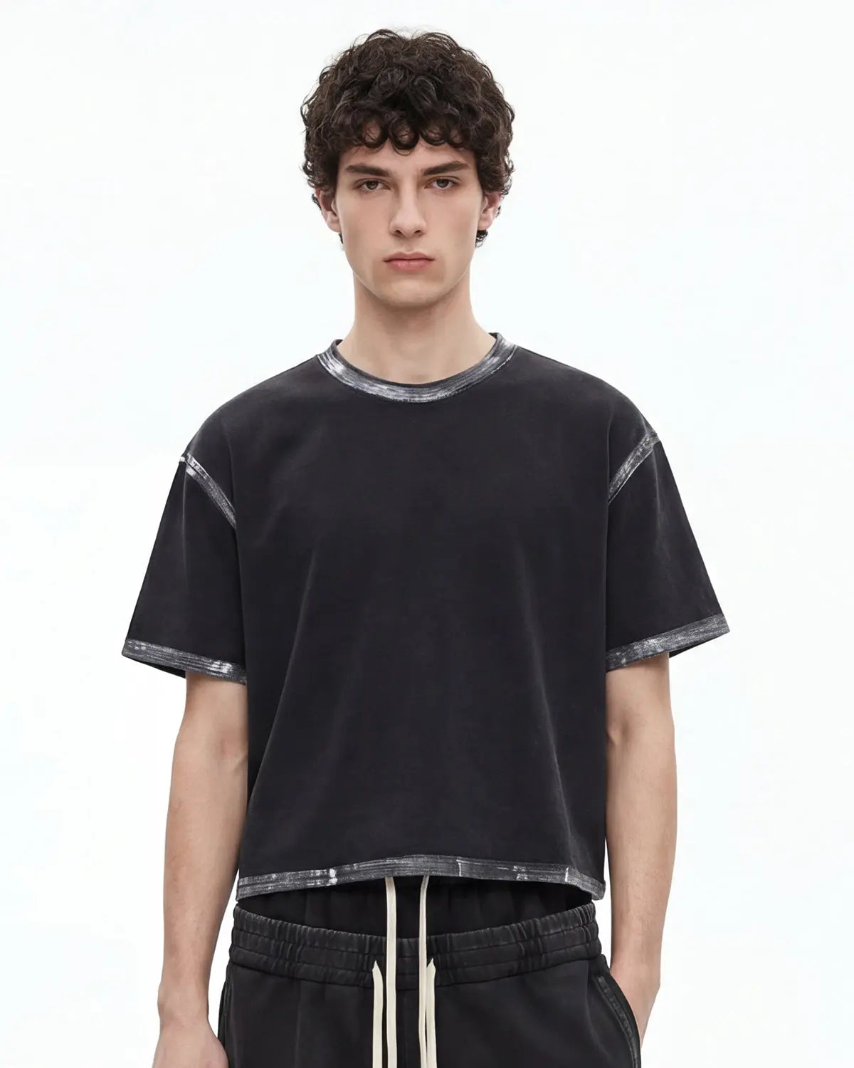 Black heavyweight boxy T-shirt by Flation Streetwear featuring a distressed wash finish, casual streetwear style.