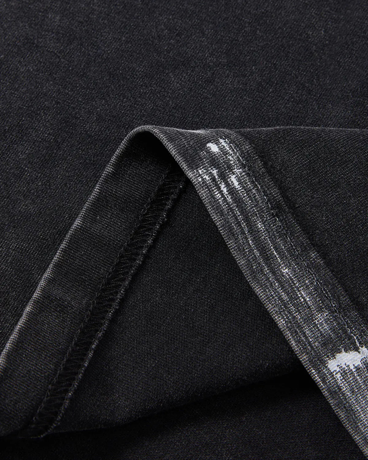 Black Flation Heavyweight Boxy T-Shirt with distressed wash and relaxed fit, casual streetwear style.
