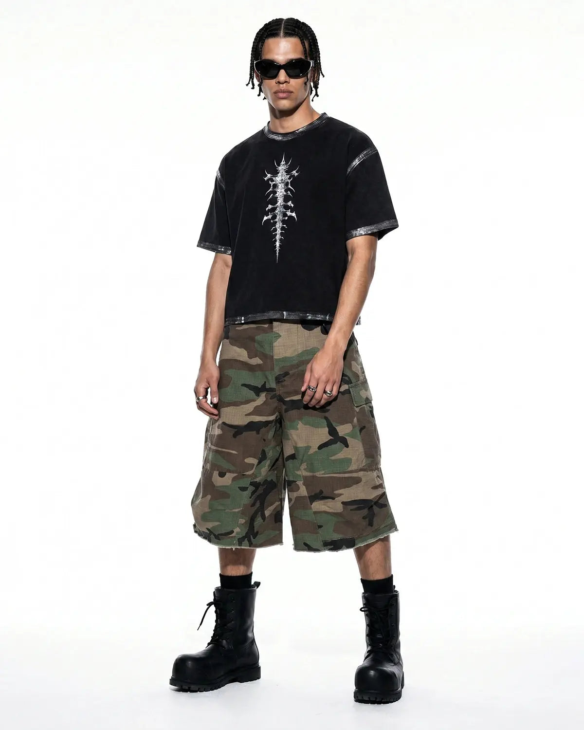 Black Flation streetwear T-shirt with distressed painted graphic design and boxy fit, casual and stylish for everyday wear.
