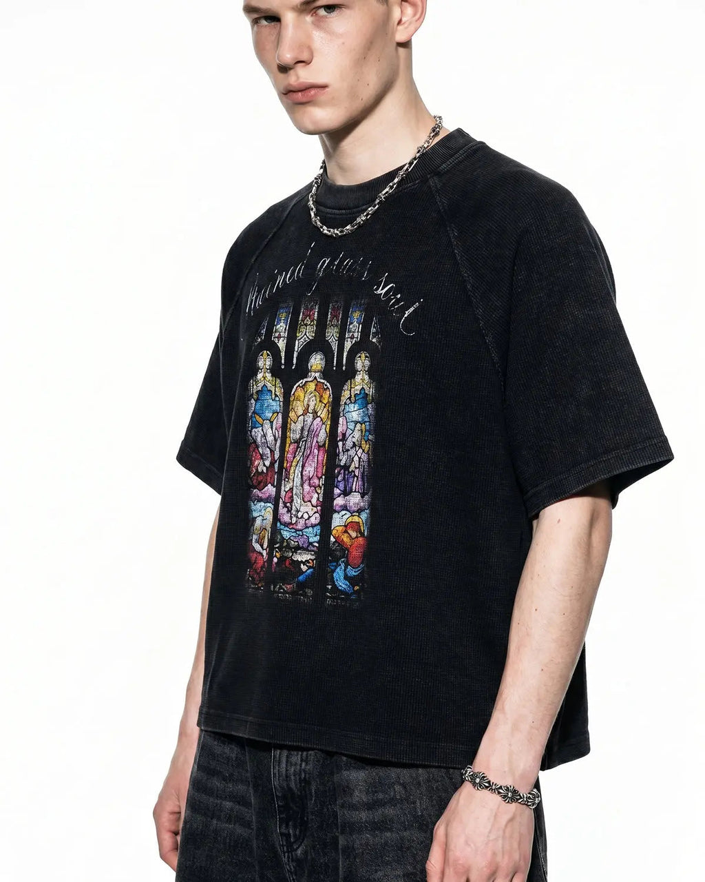 Black Flation graphic boxy waffle T-shirt featuring washed fabric and streetwear style, displayed on a flat surface.