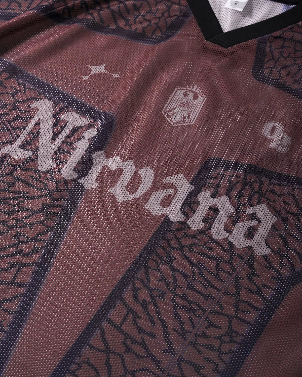 Brown tribal pattern mesh jersey t-shirt by Flation Streetwear, featuring a stylish tribal design and lightweight mesh fabric.