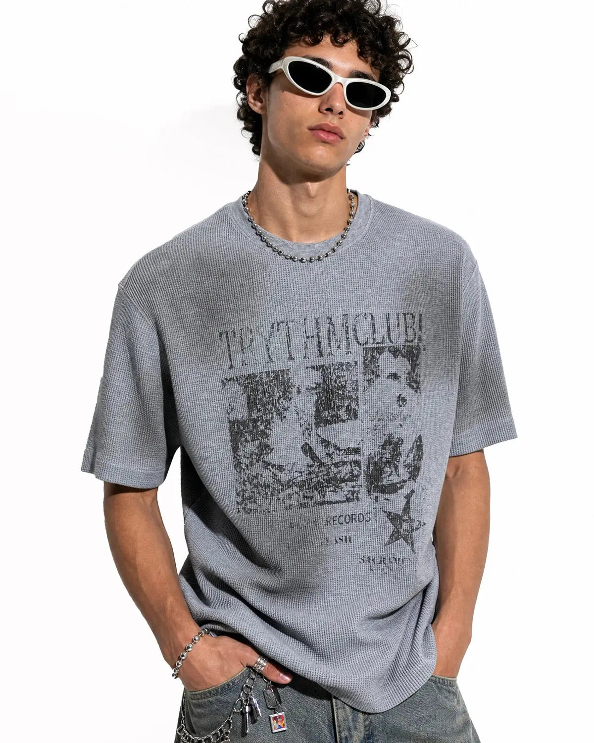 Grey distressed graphic waffle T-shirt by Flation Streetwear featuring a casual, textured design and bold graphic print.