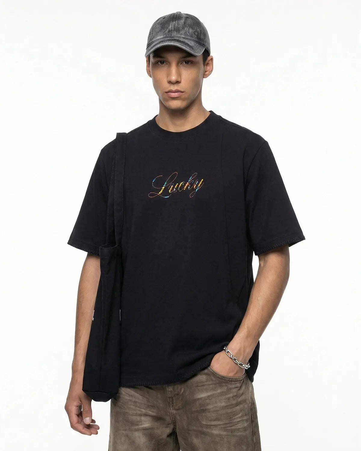 Flation Rhinestone Lucky graphic oversized T-shirt featuring bold print and sparkling rhinestone details on soft streetwear fabric.