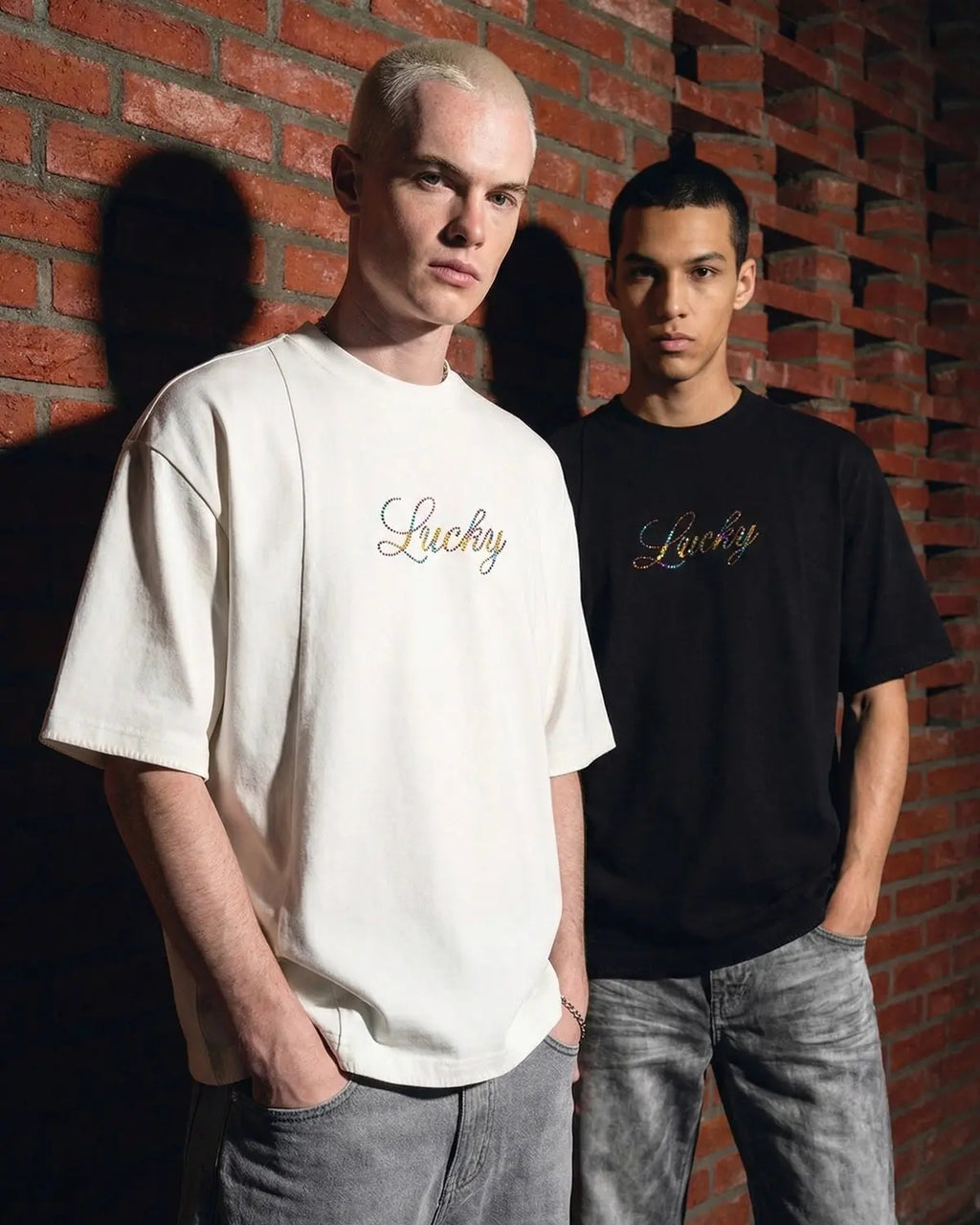 Flation Rhinestone Lucky graphic oversized T-shirt featuring bold print and sparkling rhinestone details on soft streetwear fabric.