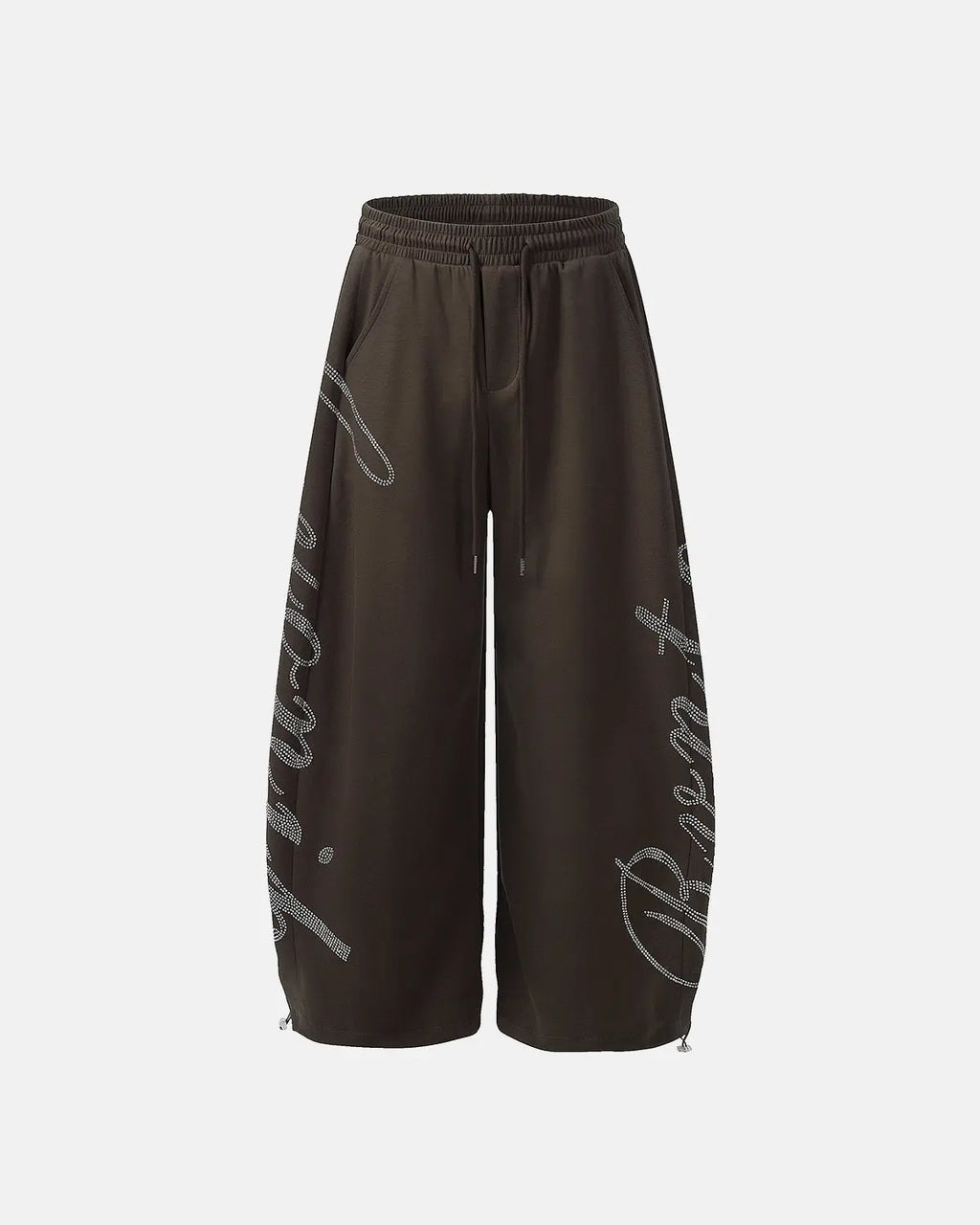 White rhinestone baggy joggers by Flation Streetwear featuring rhinestone embellishments and a relaxed fit.