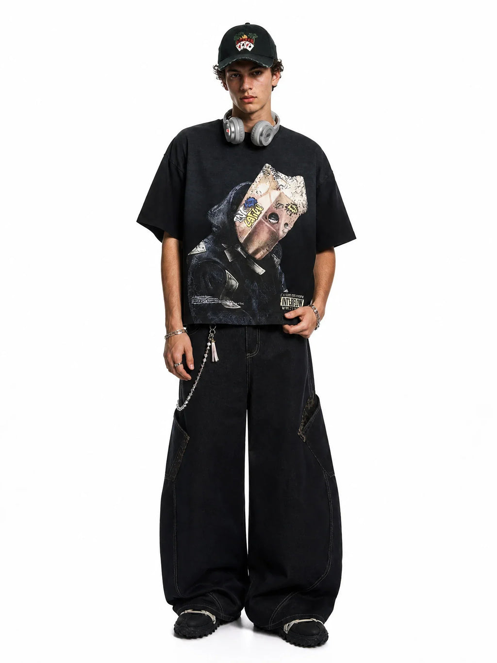Leopard patchwork barrel jeans by Flation Streetwear featuring bold animal print and relaxed fit, styled with rolled cuffs.